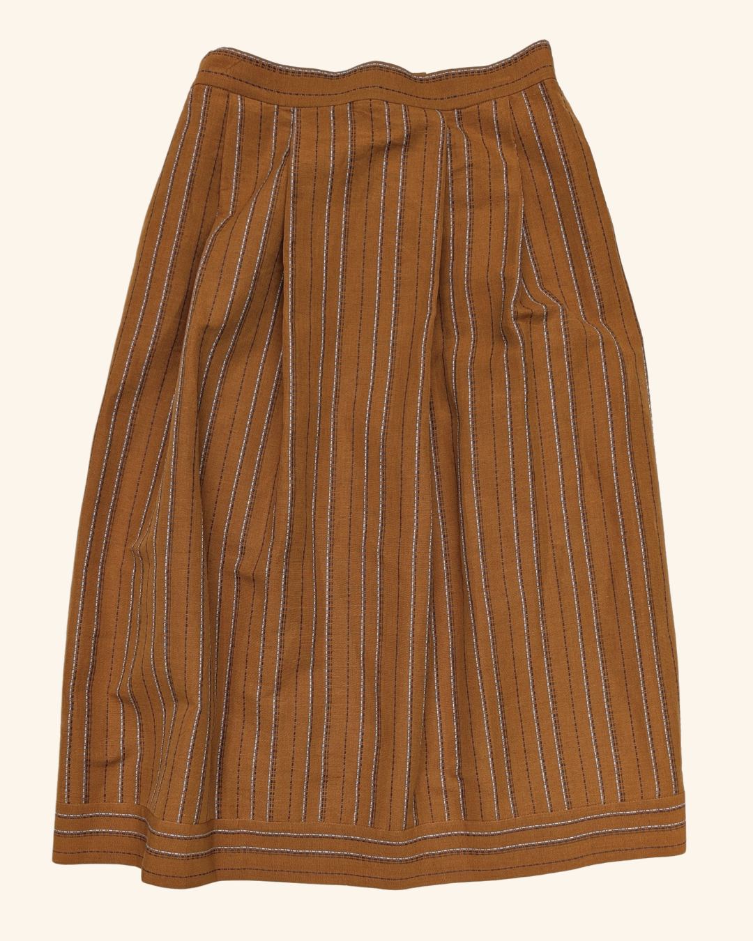 A brown straight midi skirt with pale blue and grey stripes on a white backround
